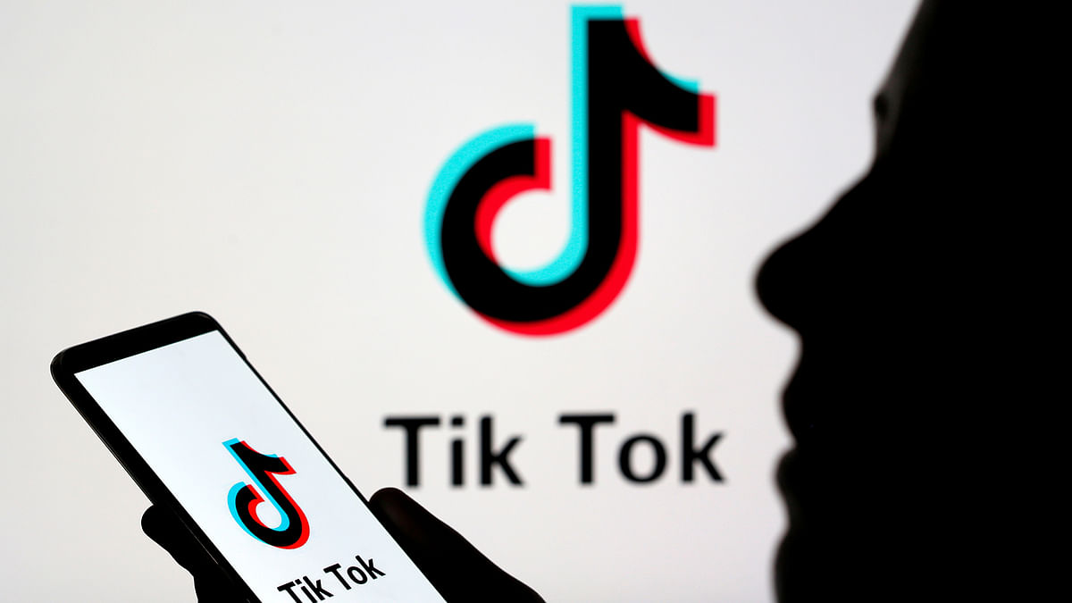 Person holds a smartphone with Tik Tok logo displayed in this picture illustration. Photo: Reuters