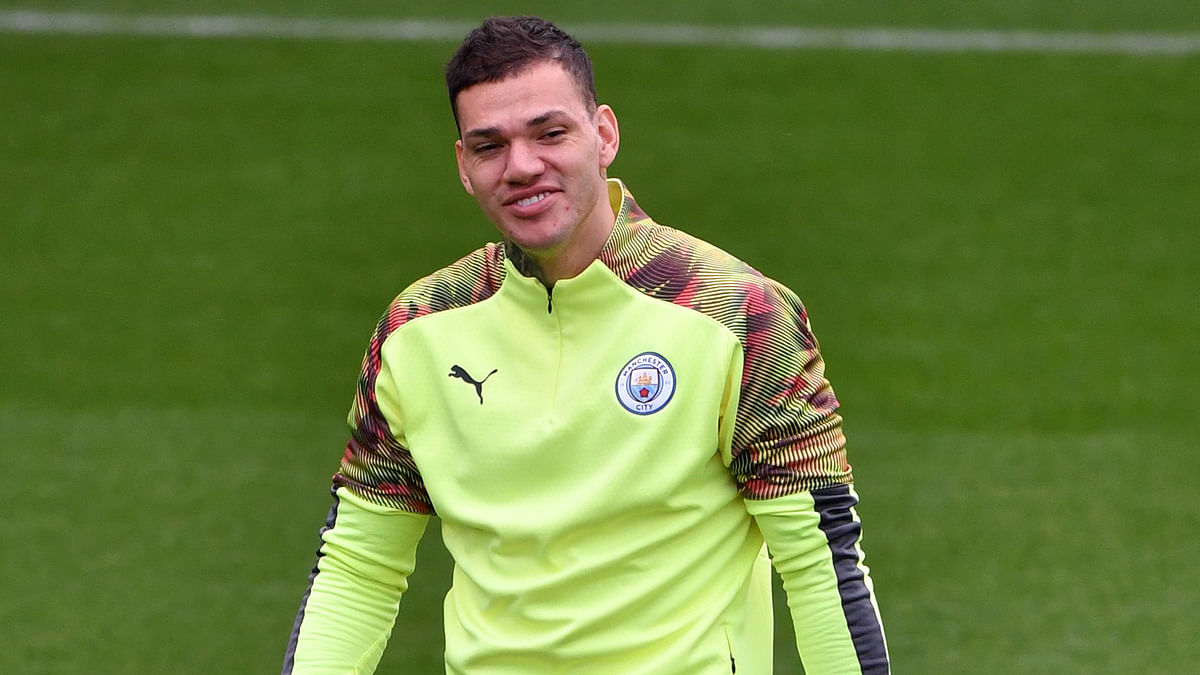 Manchester City`s Brazilian goalkeeper Ederson attends a team training session at City Football Academy in Manchester, north west England on 5 November 2019, on the eve of their UEFA Champions League football Group C match against Atalanta. AFP file photo