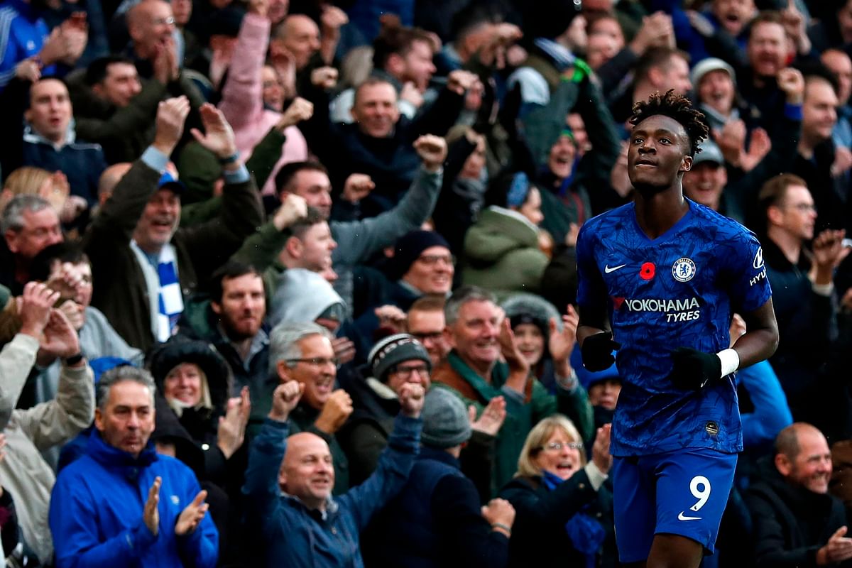 Chelsea`s English striker Tammy Abraham celebrates after he scores his team`s first goal during the English Premier League football match between Chelsea and Crystal Palace at Stamford Bridge in London on 9 November, 2019. Photo: AFP
