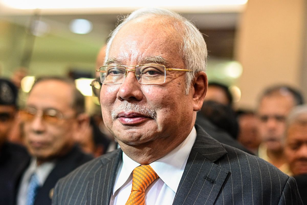 Malaysia`s former prime minister Najib Razak arrives for his trial at the High Court in Kuala Lumpur on 11 November. Photo: AFP