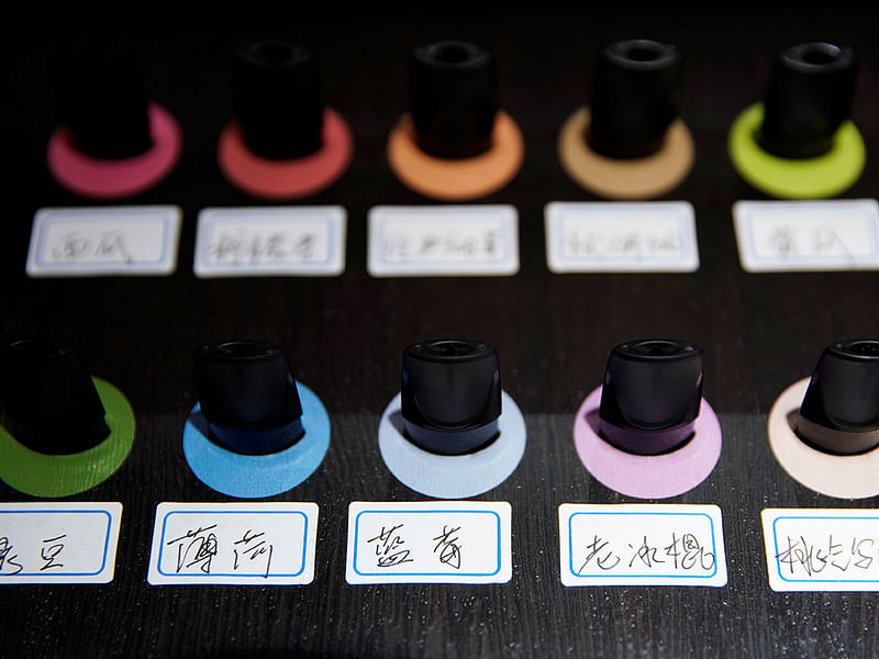 Pods of different flavors are seen on display at an authorized reseller store of Chinese e-cigarette company Relx in Shanghai. Photo: Reuters