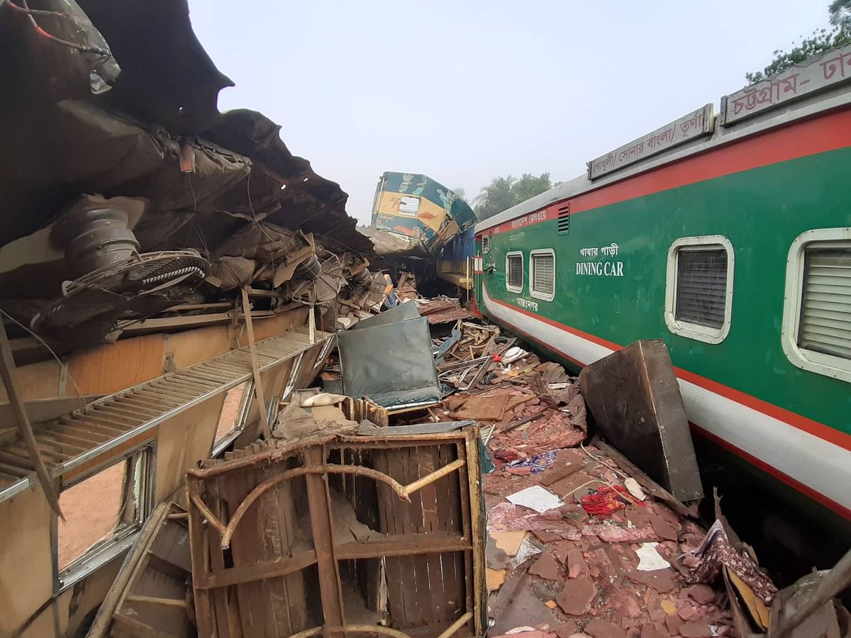 A mangled coach of Udayan Express lies on out of the rail track.
