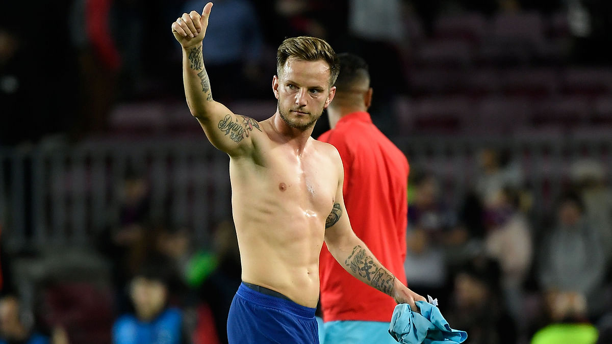 Barcelona`s Croatian midfielder Ivan Rakitic reacts at the end of the UEFA Champions League group F football match between FC Barcelona and SK Slavia Prague at the Camp Nou stadium in Barcelona on 5 November. AFP file photo