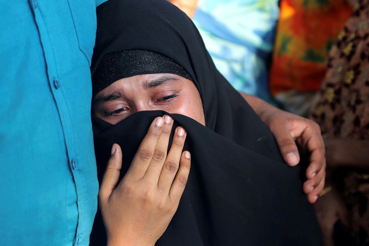 A women mourns her relatives who died in a train accident in Brahmanbaria, Bangladesh, 12 November 2019. Photo: Reuters