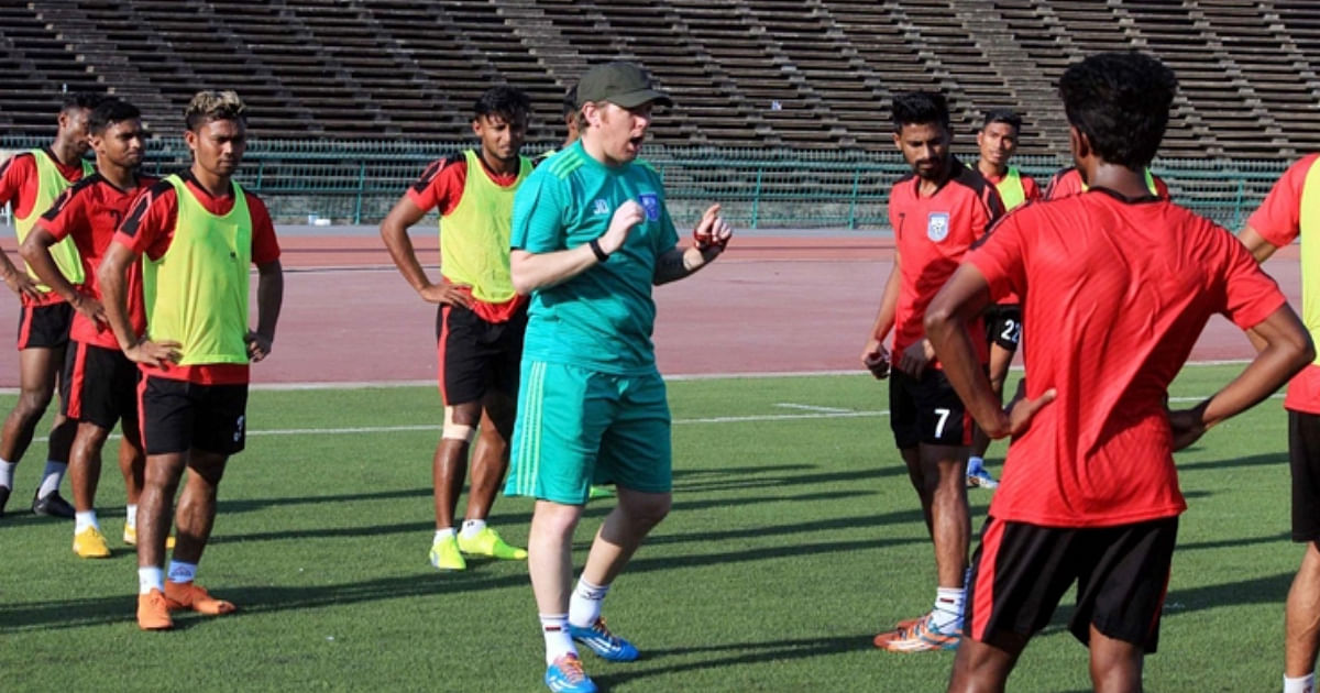 Bangladesh national football team players listens to what the coach Jamie Day speaks about. Photo: UNB