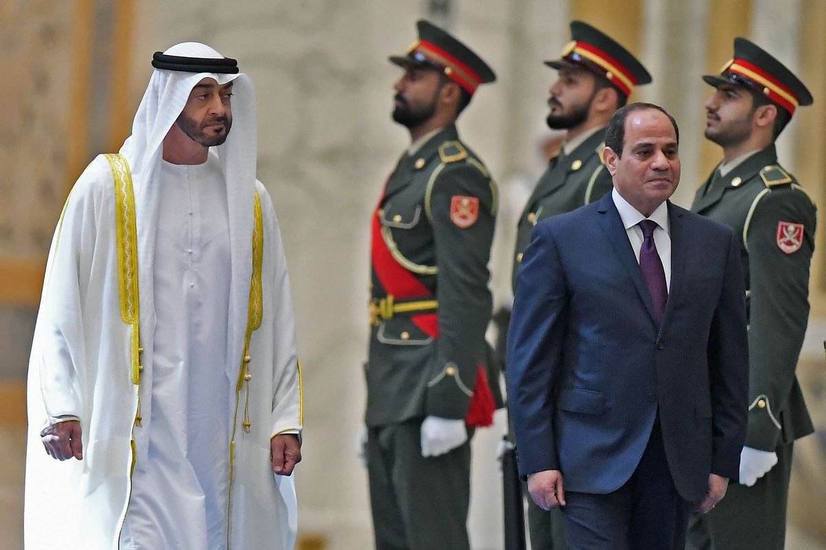 Egyptian president Abdel Fattah al-Sisi and the Crown Prince of Abu Dhabi, Sheikh Mohamed bin Zayed al-Nahyan, attend a welcome ceremony in the Emirati capital`s Al-Watan presidential palace on 14 November 2019 in Abu Dhabi. The United Arab Emirates and Egypt launched a $20 billion joint investment programme to develop `economic and social projects`. Photo: AFP