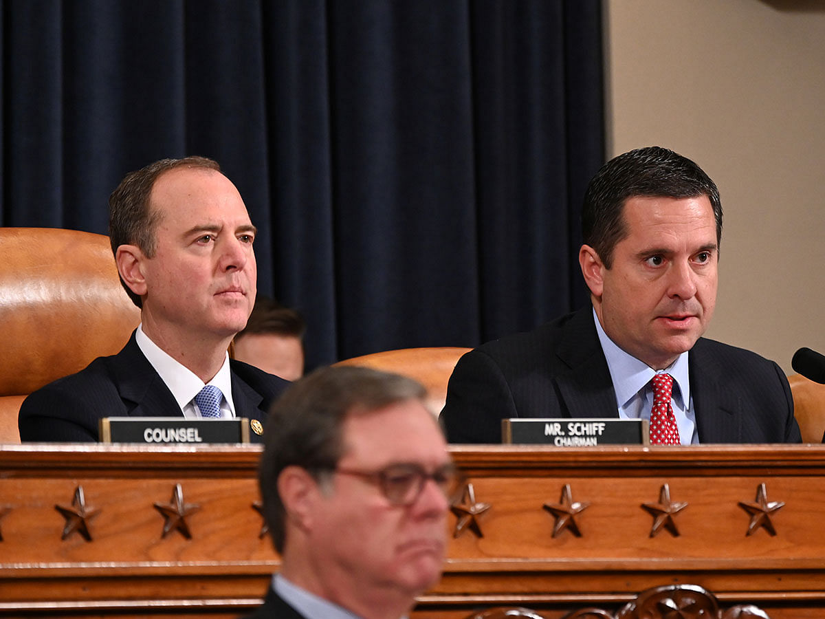 Chairman Adam Schiff (L), Democrat of California, and ranking member Devin Nunes (R), Republican of California, during the first public hearings held by the House Permanent Select Committee on Intelligence as part of the impeachment inquiry into US president Donald Trump, on Capitol Hill in Washington, DC, US on 13 November. Photo: Reuters