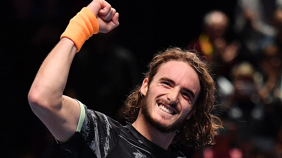 Greece`s Stefanos Tsitsipas celebrates victory against Switzerland`s Roger Federer during the men`s singles semi-final match on day seven of the ATP World Tour Finals tennis tournament at the O2 Arena in London on 16 November 2019. Photo: AFP