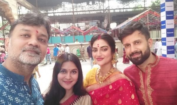 Mithila, Srijit, Nusrat and her husband Nikhil Jain during Durga Puja. Photo: Facebook