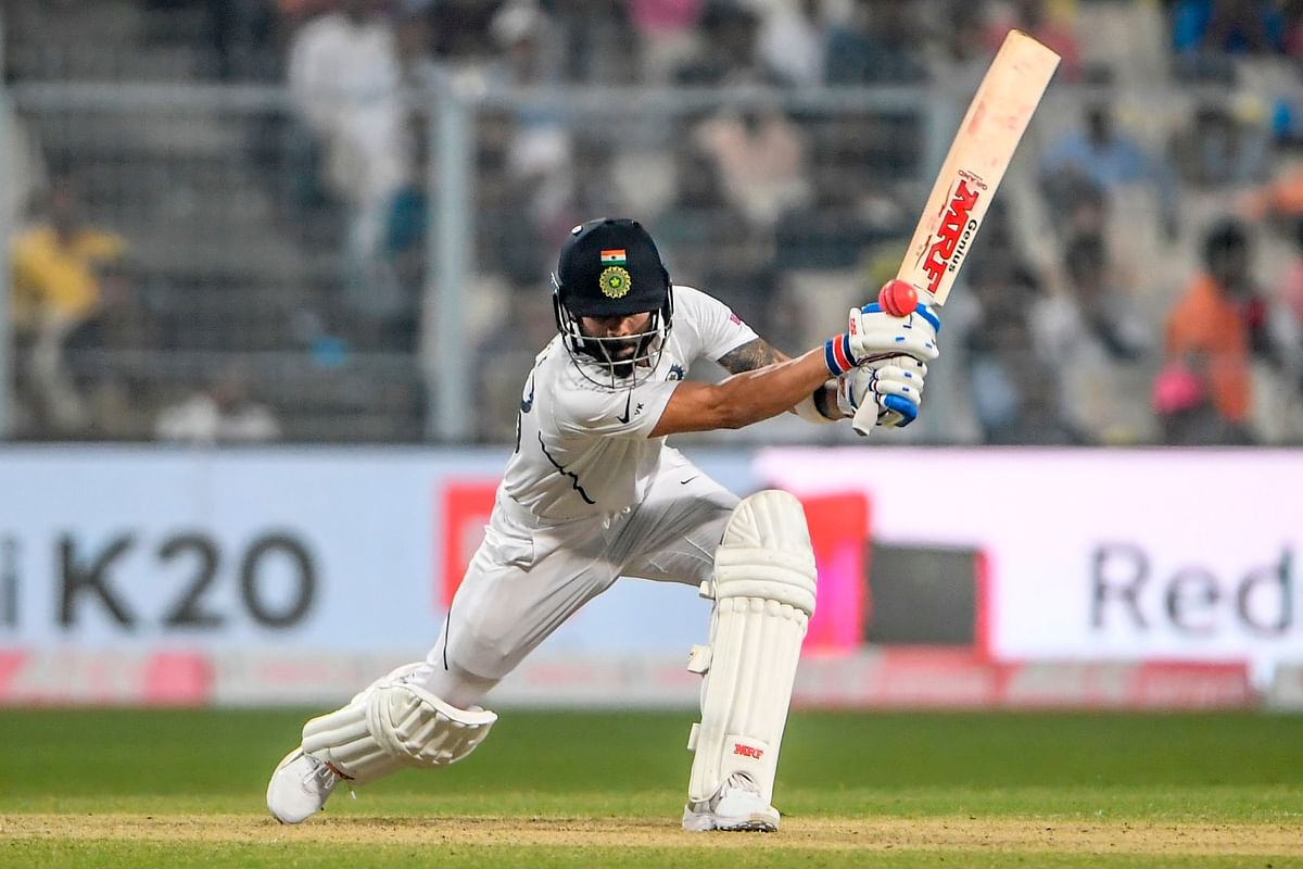 India`s cricket team captain Virat Kohli plays a shot during the first day of the second Test cricket match of a two-match series between India and Bangladesh at the Eden Gardens cricket stadium in Kolkata on November 22, 2019. AFP