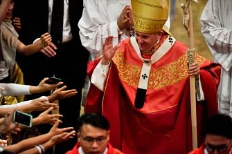 Pope Francis greets the faithful after a Holy Mass at the Assumption Cathedral in Bangkok on 22 November 2019. Photo: AFP
