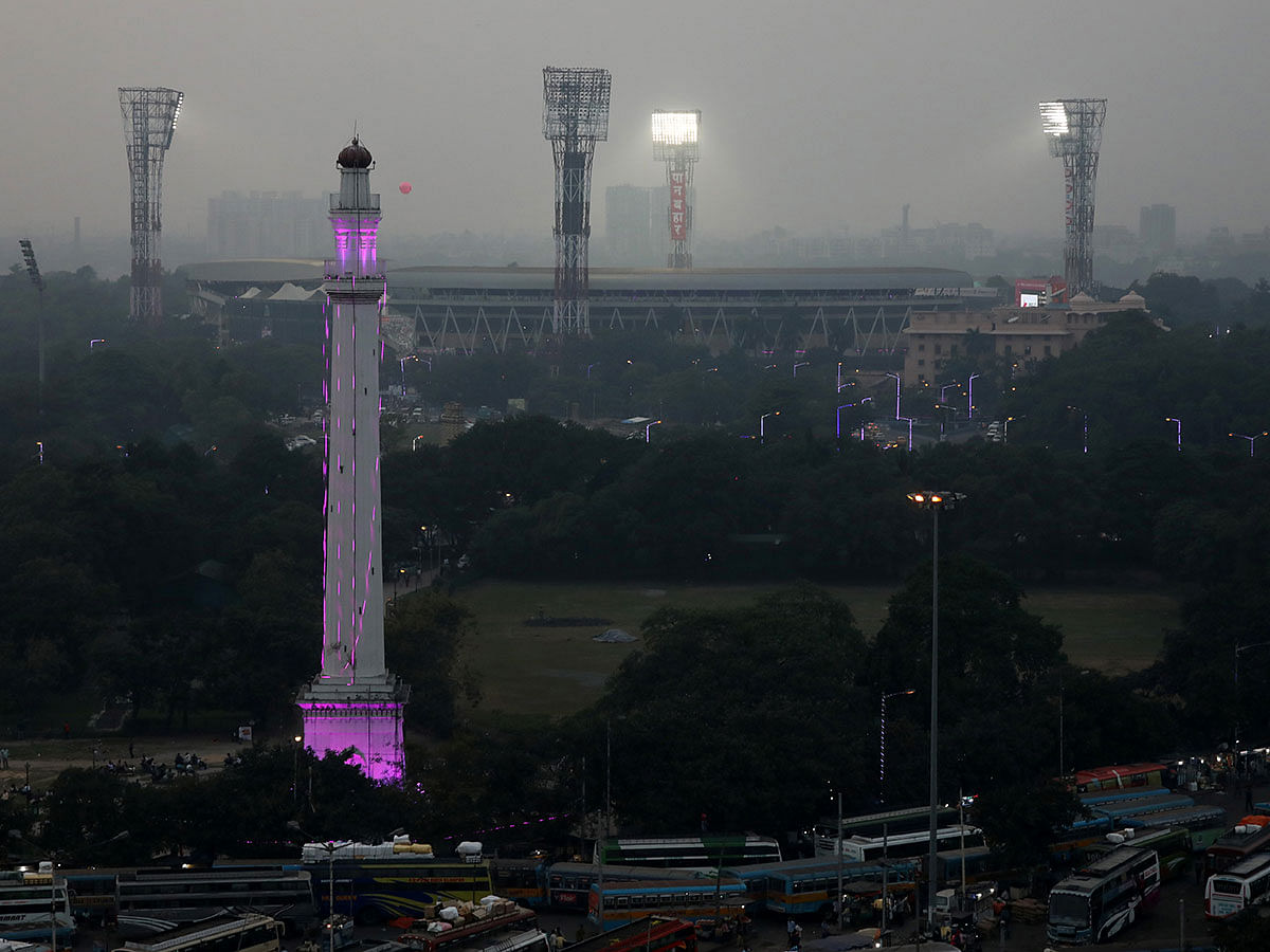 Shaheed Minar monument is illuminated in pink near Eden Gardens, where India and Bangladesh play their first day-night test cricket match using pink balls, in Kolkata, India, on 22 November 2019. Photo: Reuters