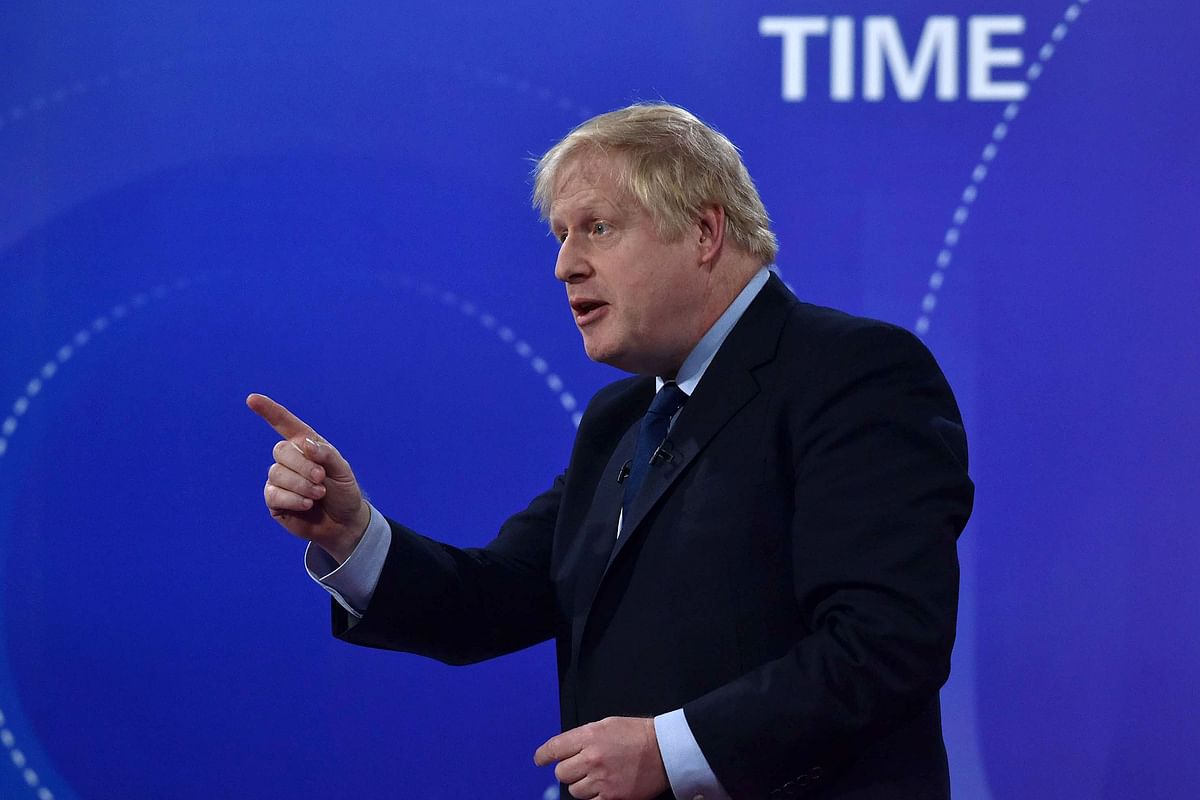 A handout picture taken and released by the BBC on 22 November 2019, shows Britain`s prime minister Boris Johnson participating on the BBC`s Question Time `Leaders Special` television show, from Sheffield, northern England, that is set to feature the leaders of Britain`s four main political parties. Photo: AFP