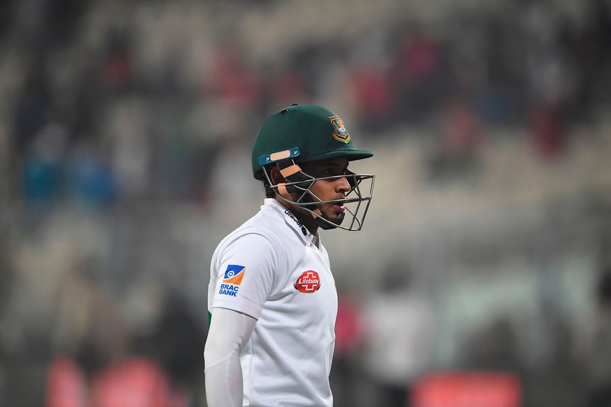 Bangladesh`s Taijul Islam walks back after loosing his wicket during the second day of the second Test cricket match of a two-match series between India and Bangladesh at the Eden Gardens cricket stadium in Kolkata on 23 November 2019. Photo: AFP