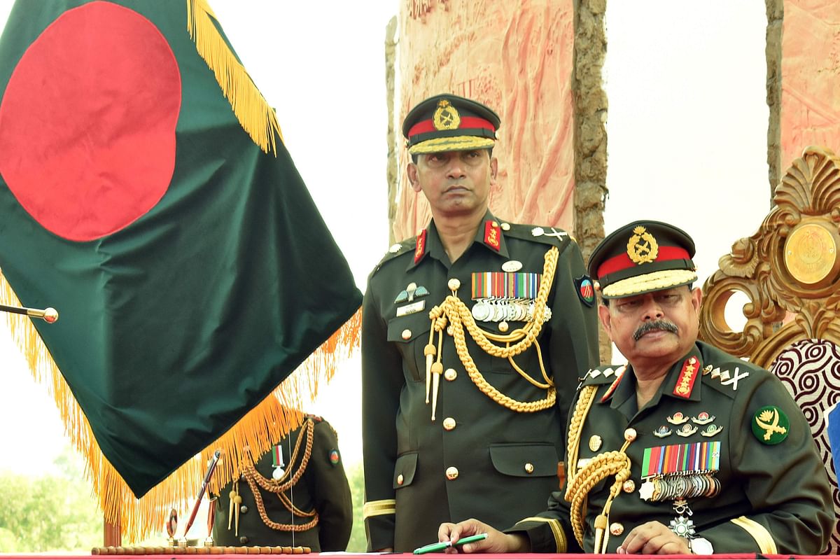 Army chief General Aziz Ahmed (R) looks on during a programme in a refugee camp in Ukhia on 24 November 2019. Photo: AFP
