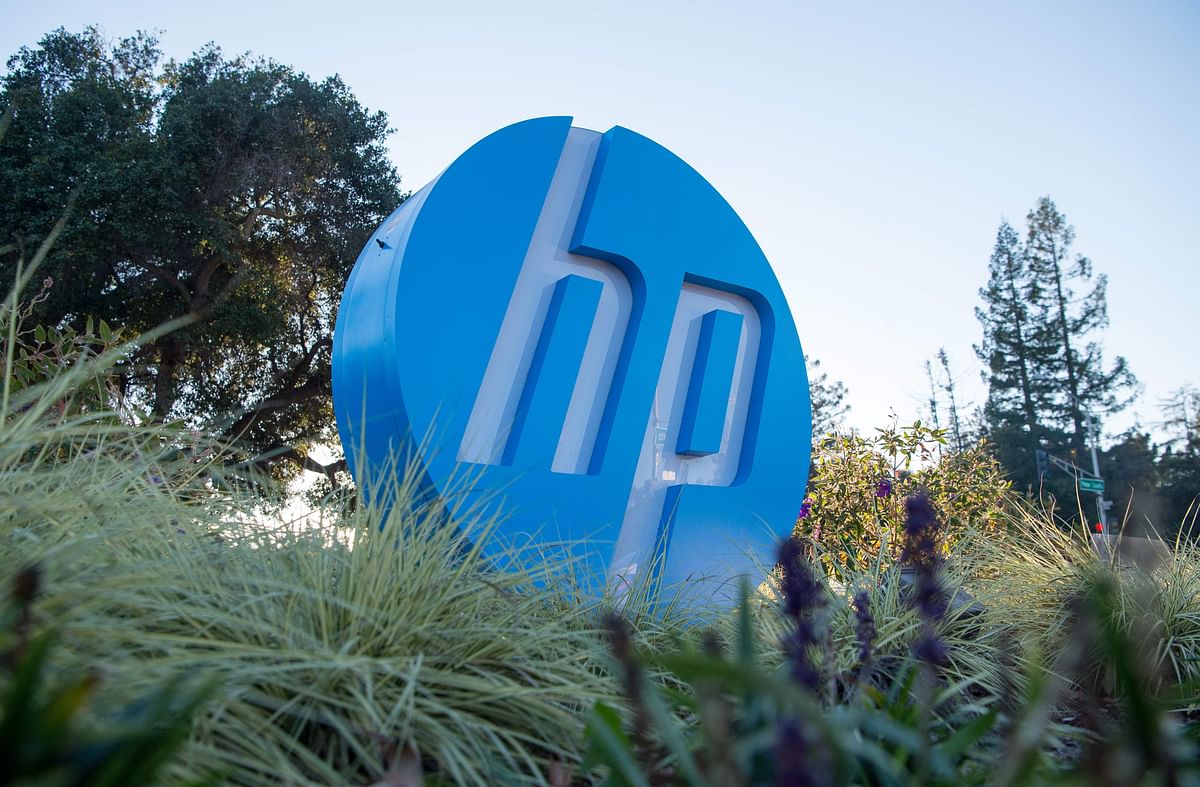In this file photo taken on 4 November, 2016 the HP logo is seen on a sign at Hewlett Packard`s headquarters in Palo Alto, California. Photo: AFP