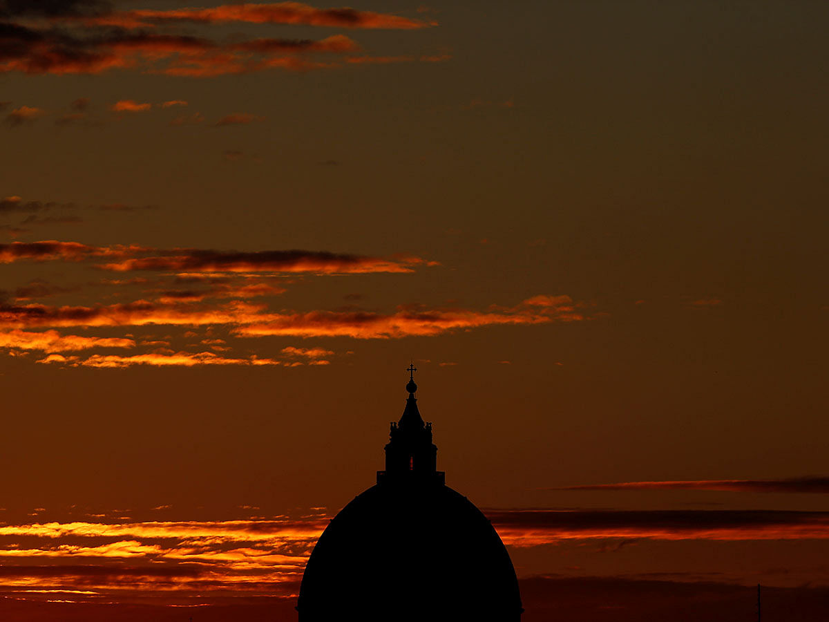 The dome of Saint Peter`s Basilica is seen during sunset from Pincio terrace in Rome, Italy, 25 November 2019. Photo: Reuters