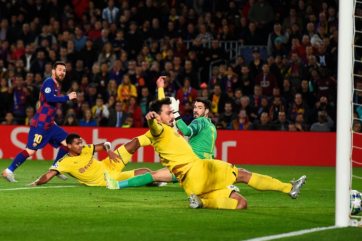 Barcelona`s Argentine forward Lionel Messi (L) scored a goal during the UEFA Champions League Group F football match between FC Barcelona and Borussia Dortmund at the Camp Nou stadium in Barcelona, on 27 November 2019. Photo: AFP