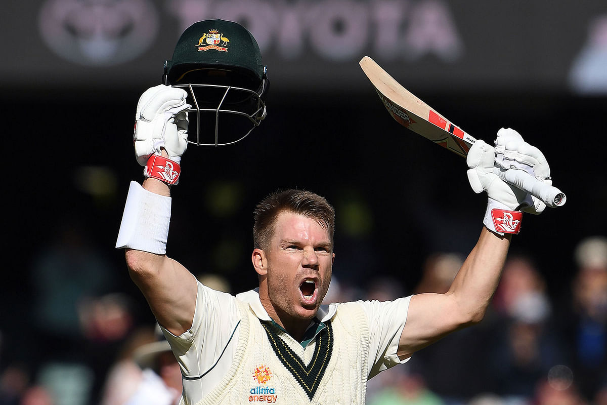 Australia`s batsman David Warner celebrates reaching his triple century (300 runs) during the day two of the second cricket Test match between Australia and Pakistan in Adelaide on 30 November, 2019. Photo: AFP.