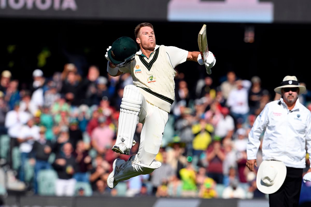 Australia`s batsman David Warner celebrates reaching his triple century (300 runs) during the day two of the second cricket Test match between Australia and Pakistan in Adelaide on 30 November 2019. Photo: AFP