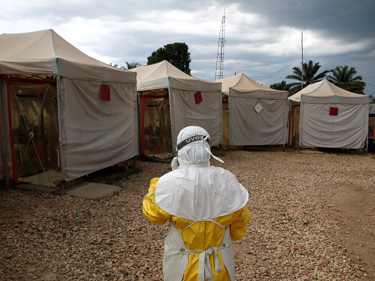A health worker wearing Ebola protection gear, walks before entering the Biosecure Emergency Care Unit (CUBE) at the ALIMA (The Alliance for International Medical Action) Ebola treatment centre in Beni, in the Democratic Republic of Congo, on 30 March 2019. Reuters File Photo