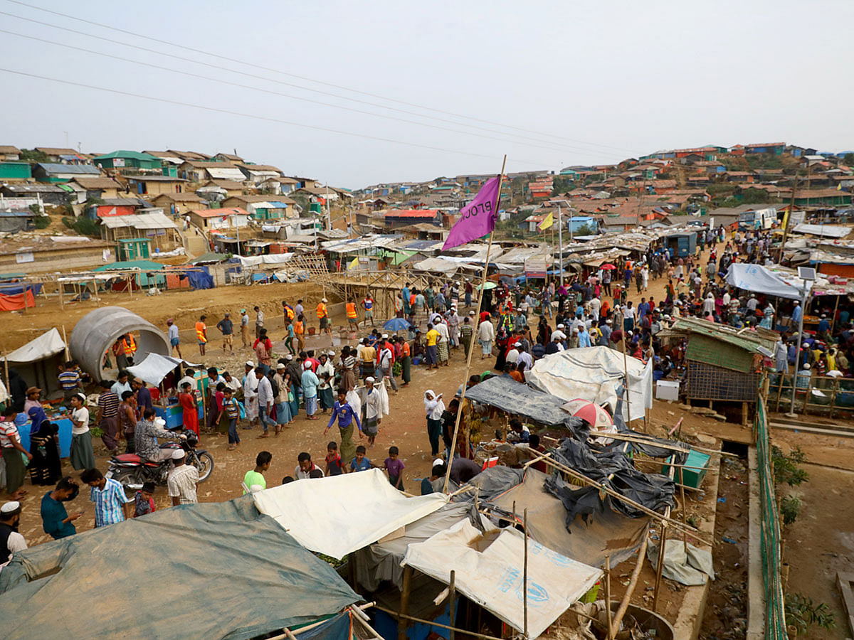 Rohingya refugees gather at a market inside a refugee camp in Cox`s Bazar, Bangladesh, on 7 March 2019. Photo: Reuters