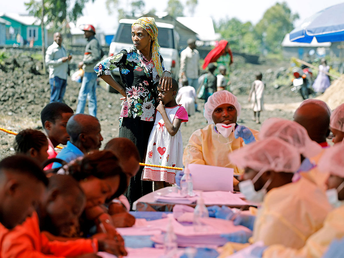 A woman and child wait to receive an Ebola vaccination in Goma, Democratic Republic of Congo, on 5 August 2019. Reuters File Photo