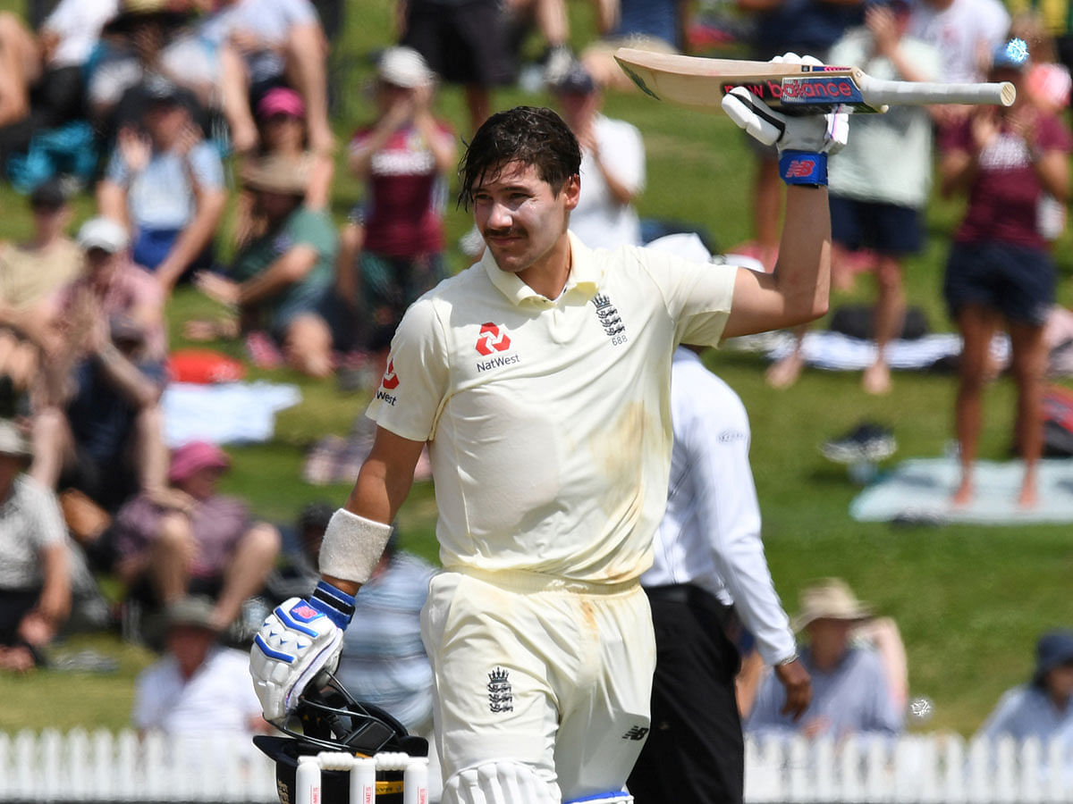 England`s Rory Burns celebrates his century in the Second Test against England at Seddon Park, Hamilton, New Zealand on 1 December 2019. Photo: Reuters