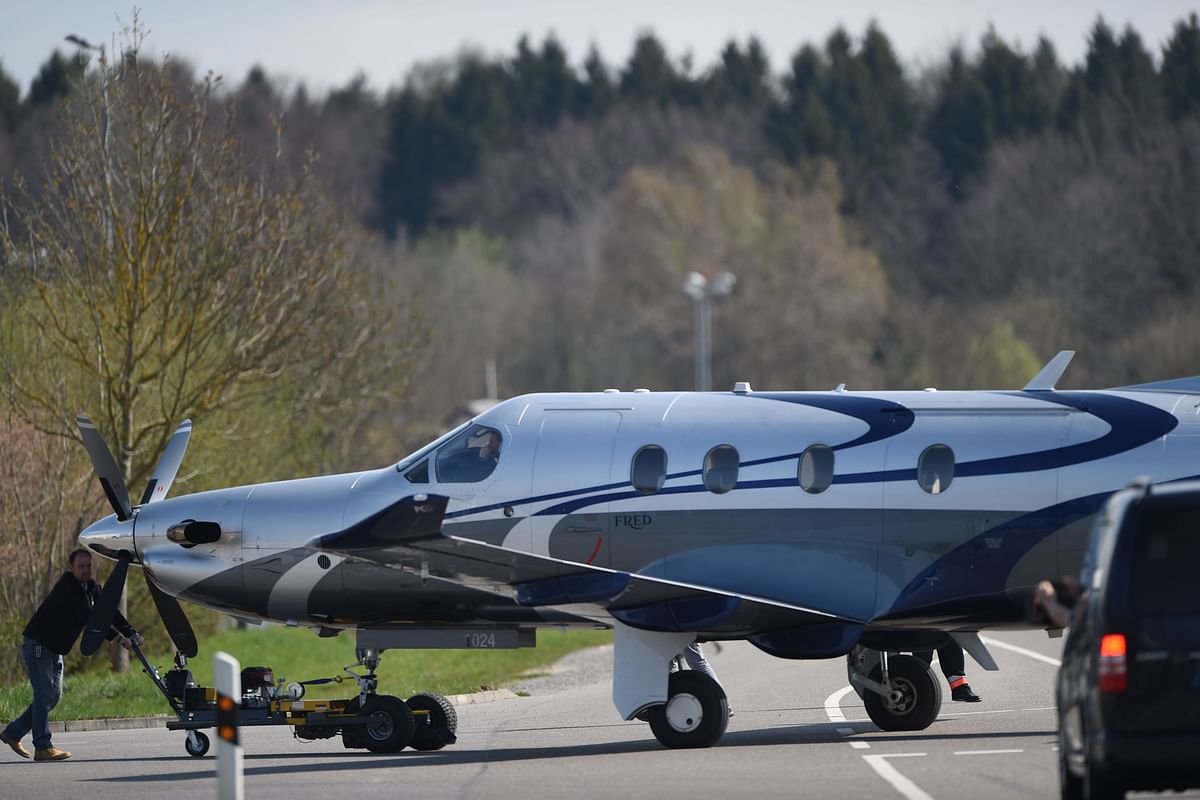 In this file photo taken on 13 April 2015 a `PC-12` single-engined aircraft of Swiss manufacturer Pilatus Aircraft is pulled over a street to the fair grounds in Friedrichshafen, southern Germany, during preparations for the `Aero` show for general aviation. Photo: AFP