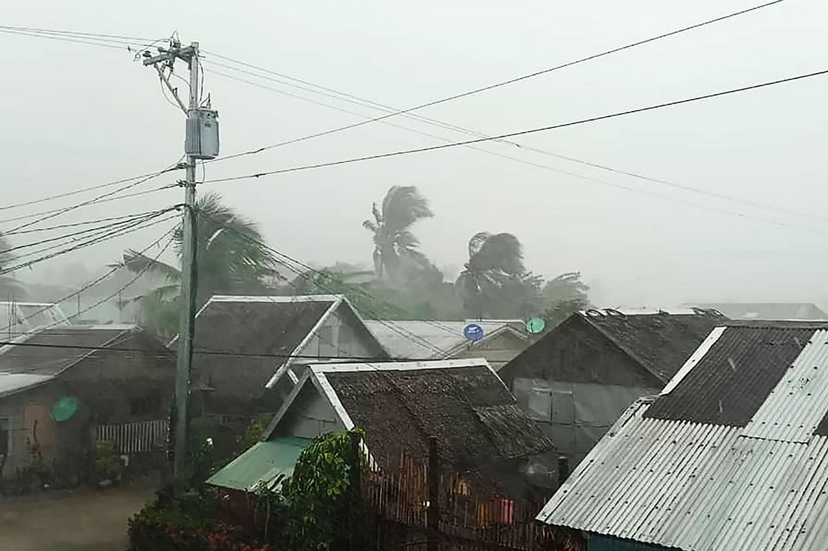 Heavy rains and moderate wind batter houses in Gamay town, Northern Samar province, central Philippines on 2 December 2019, as Typhoon Kammuri hits the province. The Philippines was braced for powerful Typhoon Kammuri as the storm churned closer, forcing evacuations and threatening plans for the Southeast Asian Games events near the capital Manila. Photo: AFP