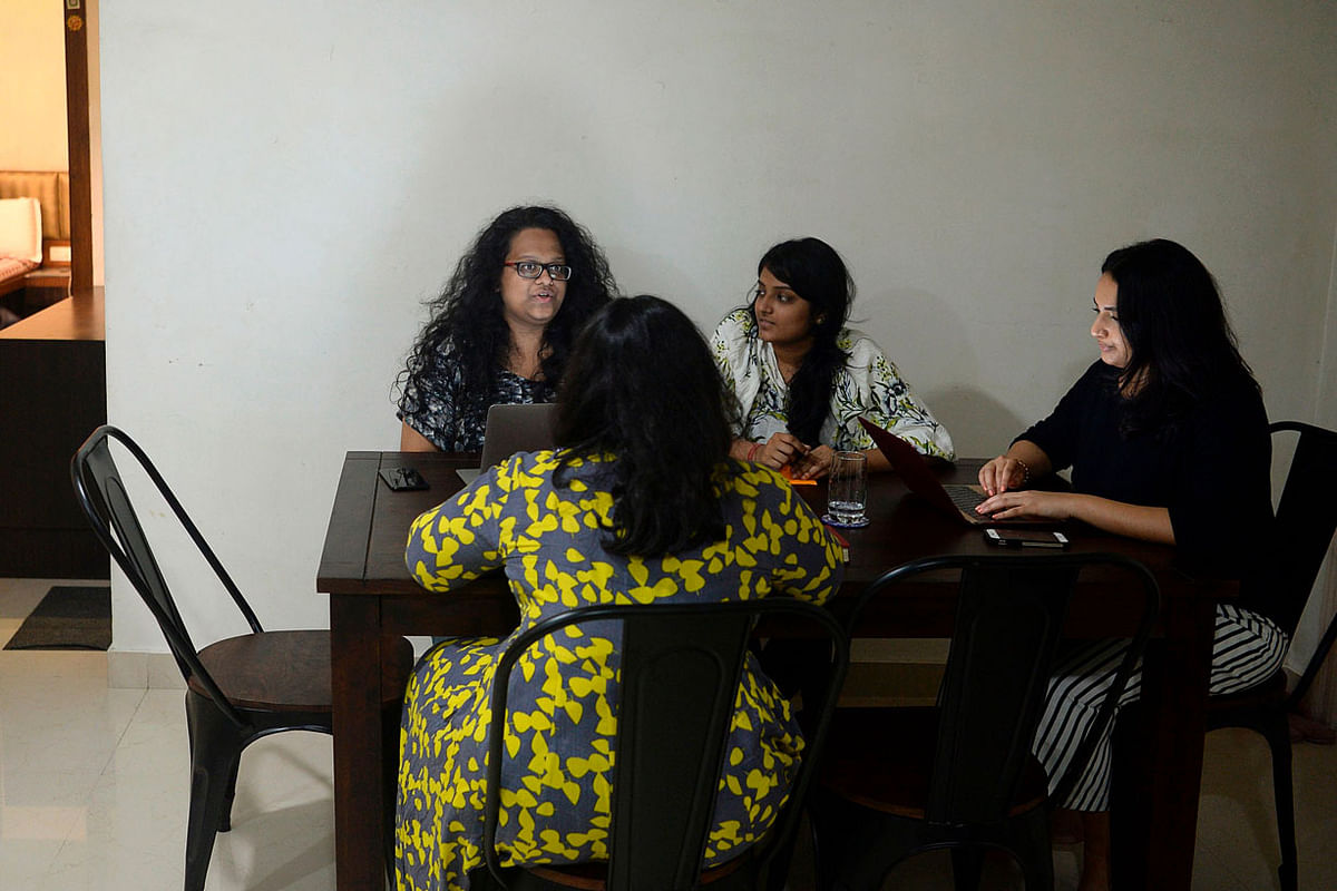 Vandita Morarka, 25, interacts with her colleagues as they sit around rented furnitures, in Mumbai. Growing number of Indian millennials bucking traditional norms and instead opting to rent everything from furniture to iPhones. Photo: AFP