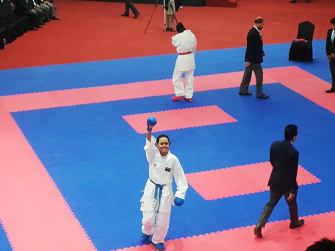 Marzan Akter waves to the gallery after winning gold in the 55-kg category of karate kumi in the ongoing 13th South Asian Games in Kathmandu, Nepal on 3 December 2019. Photo: Prothom Alo