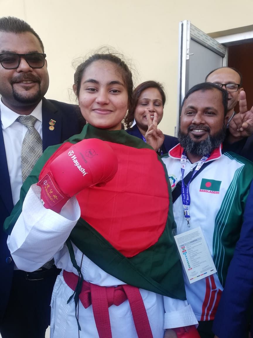 Humaira Akther after winning gold in the 61-kg category of karate kumi in the ongoing 13th South Asian Games in Kathmandu, Nepal on 3 December 2019. Photo: Prothom Alo