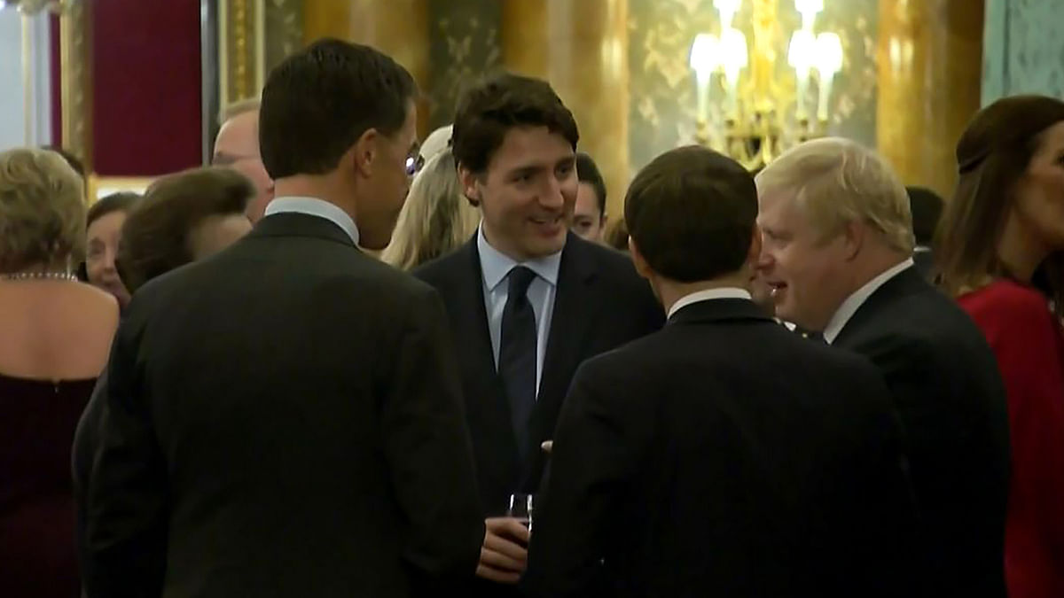 Dutch prime minister Mark Rutte (L), French president Emmanuel Macron (front), British prime minister Boris Johnson (R) and Canada`s Prime Minister Justin Trudeau (back-C) as the leaders of Britain, Canada, France and the Netherlands were caught on camera at a Buckingham Palace reception mocking US President Donald Trump`s lengthy media appearances ahead of the NATO summit on Tuesday in London. Photo: AFP