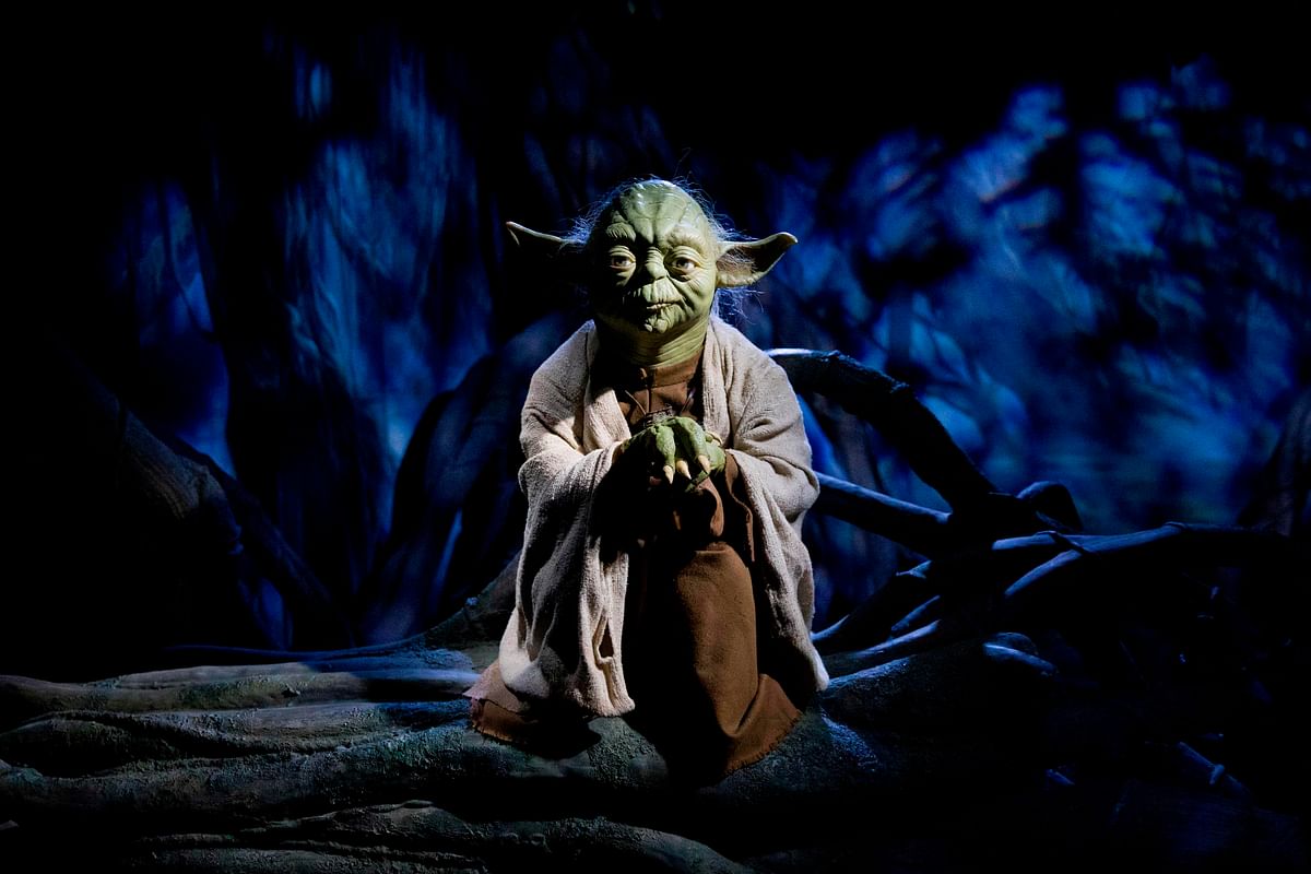 In this file photo taken on 12 May 2015, the wax figure of Star Wars character Yoda is pictured at the Star Wars At Madame Tussauds attraction in London. Photo: AFP