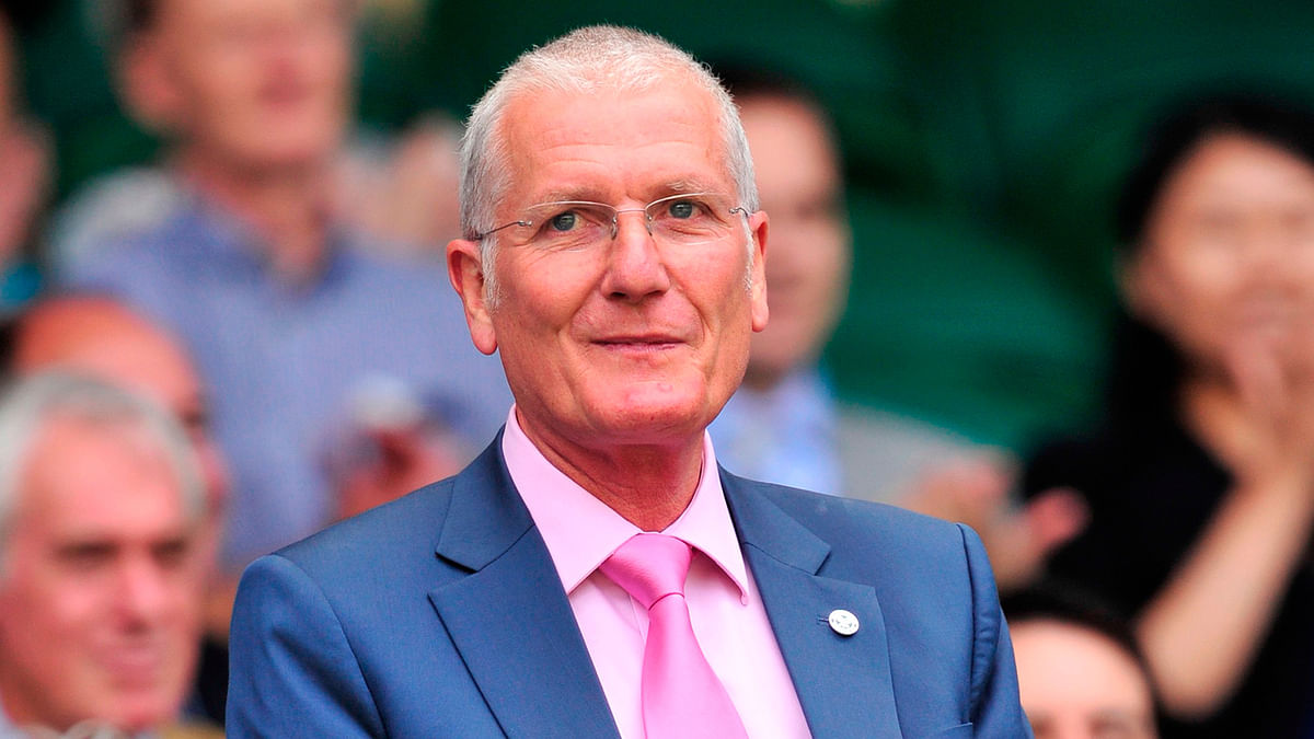 Former England cricketer Bob Willis is seen in the Royal Box on Centre Court on day six of the 2012 Wimbledon Championships in south-west London on 30 June 2012. Photo: AFP