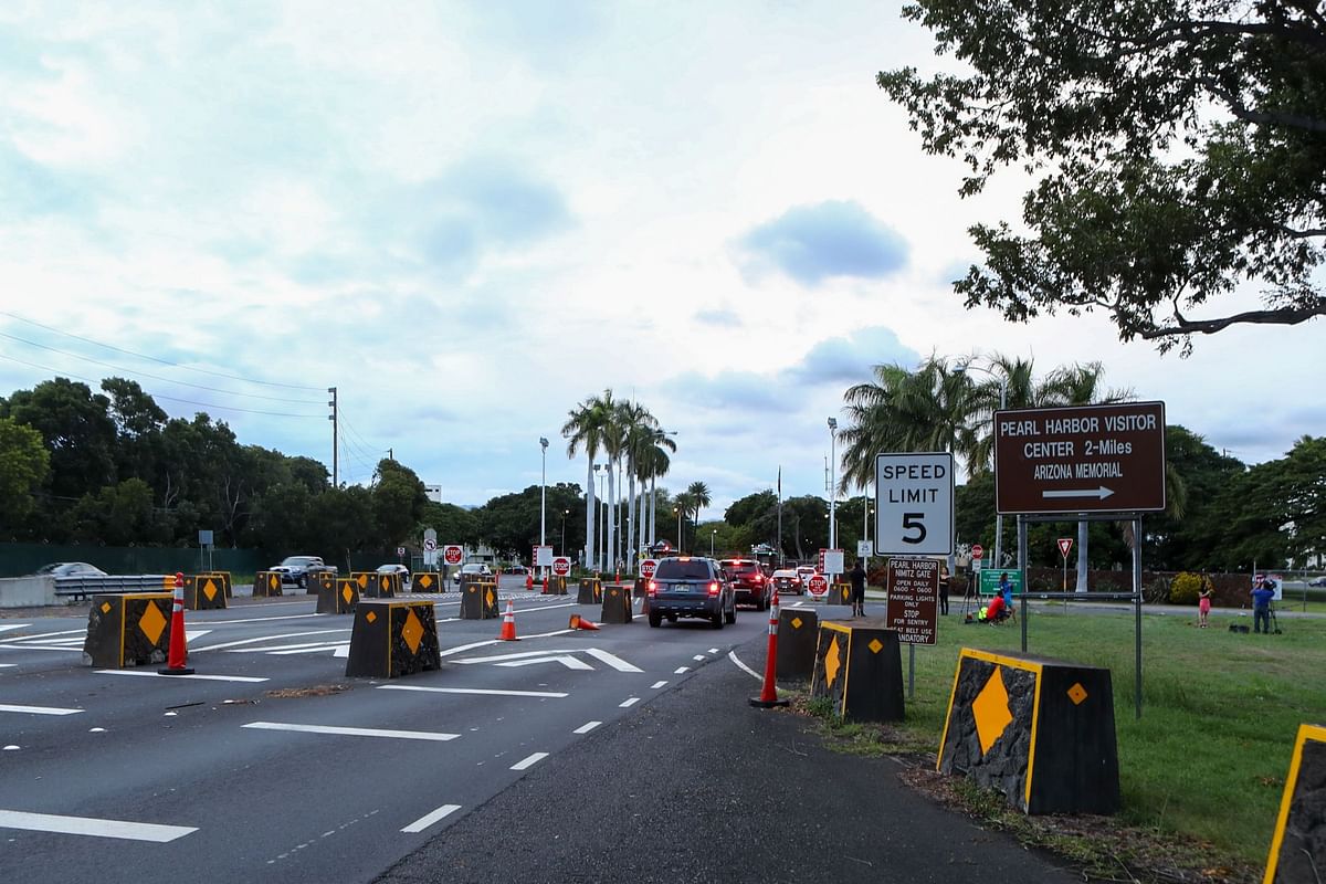 Cars wait in line to enter at the Nimitz Gate of Joint Base Pearl Harbor-Hickam on 4 December 2019 in Honolulu, United States. Photo: AFP