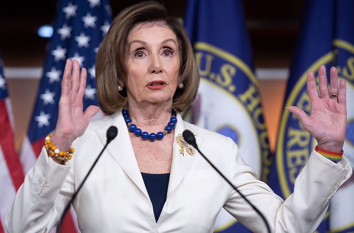 US Speaker of the House Nancy Pelosi holds her weekly press conference on Capitol Hill in Washington, DC, Thursday. Pelosi told congressional leaders Thursday to draft articles of impeachment against Donald Trump, saying the president`s abuse of power `leaves us no choice but to act.` Photo: AFP