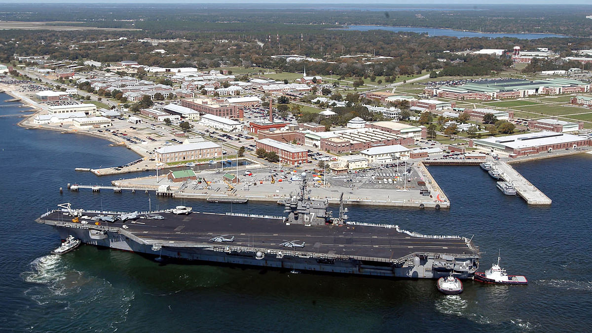 This US Navy file handout photo shows the USS John F. Kennedy arriving at the Naval Air Station in Pensacola, Florida, on 18 March, 2004. US Media and US Navy are reporting an active shooter at the Air Station on 6 December, 2019. Photo: AFP