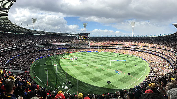 Panorama of the Melbourne Cricket Ground during the national anthem prior to the AFL Grand Final on 30 September 2017 in Melbourne, Victoria, Australia. Photo: Flickerd/commons.wikimedia.org