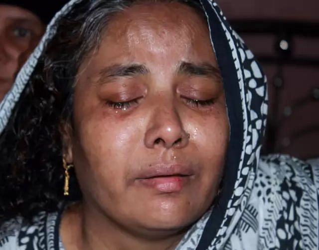 Sharmin`s mother Nahida Akter mourns her daughter`s death in Mymensingh on 7 December, 2019. Photo: Anwar Hossain