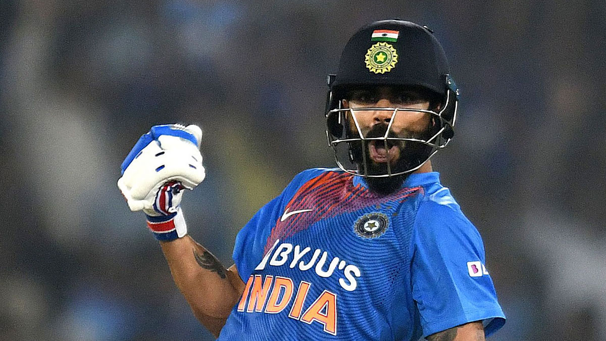 Indian cricket captain Virat Kohli celebrates winning the match against West Indies during the first T20 international cricket match of a three-match series between India and West Indies at the Rajiv Gandhi International Cricket Stadium in Hyderabad on 6 December, 2019. Photo: AFP