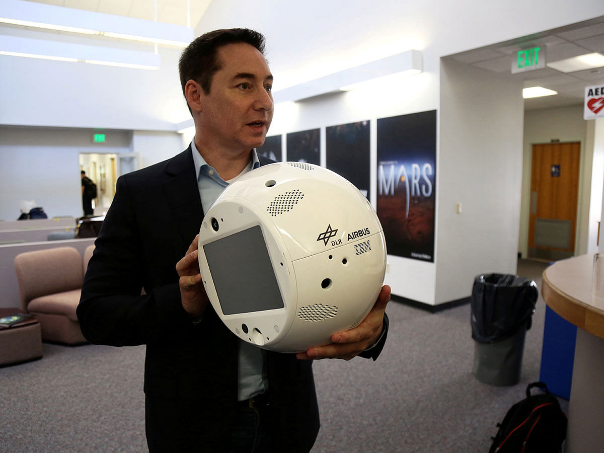 Bret Greenstein, IBM Global vice president of Watson Internet of Things Offerings, holds a clone of an artificial intelligence bot named CIMON, at the Kennedy Space Center in Florida, US on 28 June 2018. Photo: Reuters