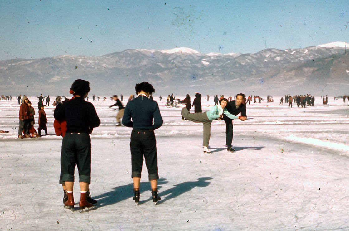 People enjoy skating on a frozen Lake Suwa in this handout photo taken around the 1950s, released by Suwa City Museum and obtained by Reuters on 28 November. Photo: Reuters