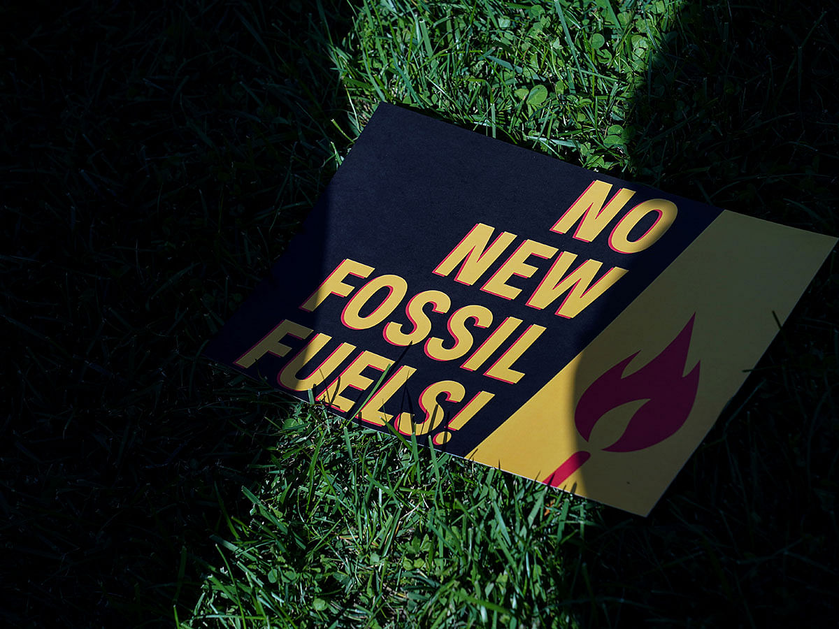 A sign protesting fossil fuels is seen on the lawn outside of the U.S. Capitol as actor and activist Jane Fonda leads the `Fire Drill Fridays` protest in Washington, US on 18 October. Photo: Reuters