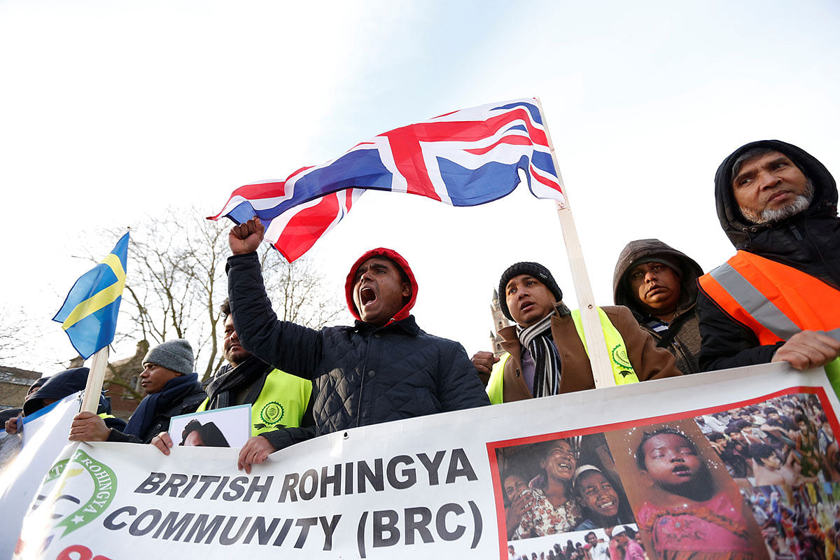 People protest outside the International Court of Justice (ICJ) during a hearing in a case filed by Gambia against Myanmar alleging genocide against the minority Muslim Rohingya population, in The Hague, Netherlands on 10 December 2019. Photo: Reuters