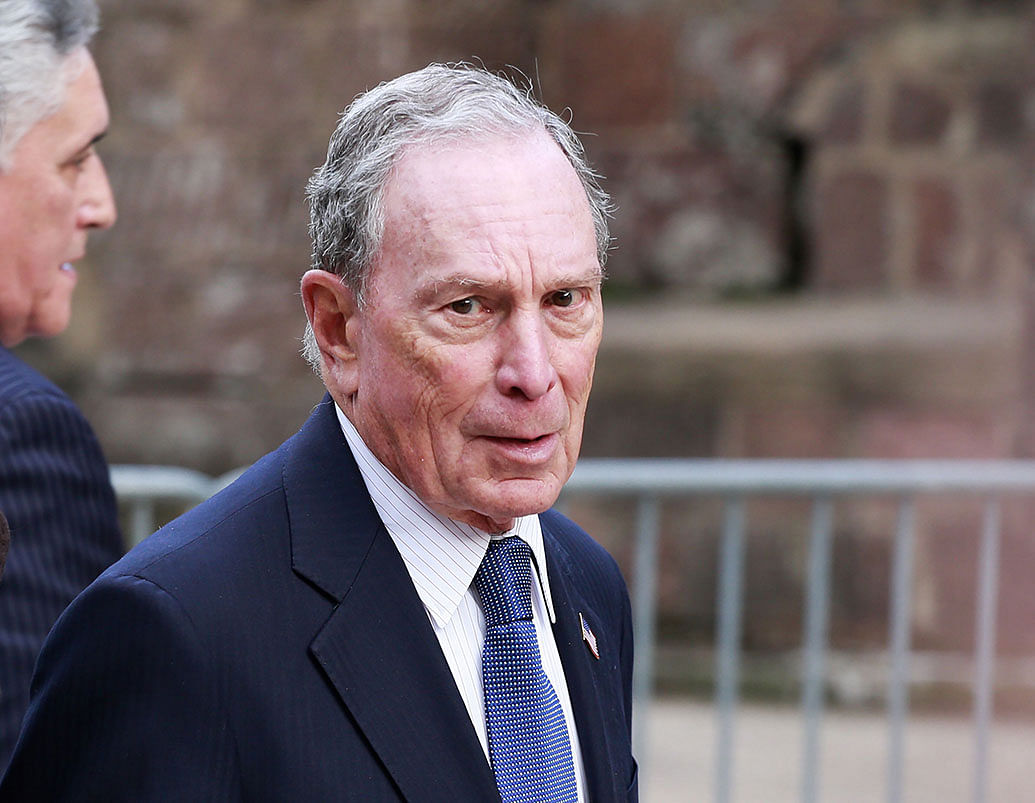 In this file photo taken on 15 May Michael Bloomberg arrives to the opening celebration of the Statue of Liberty Museum on Liberty Island at the Statue Cruises Terminal in Battery Park in New York. Photo: AFP