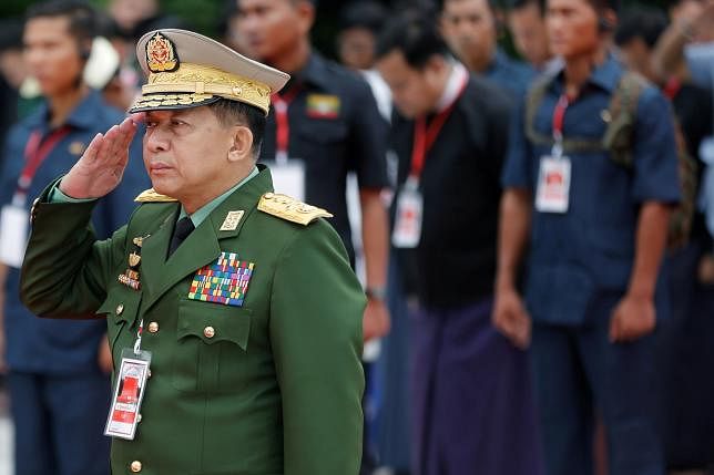 Myanmar’s commander in chief senior general Min Aung Hlaing salutes as he attends an event marking Martyrs’ Day at Martyrs’ Mausoleum in Yangon, Myanmar on 19 July 2018. Reuters File Photo