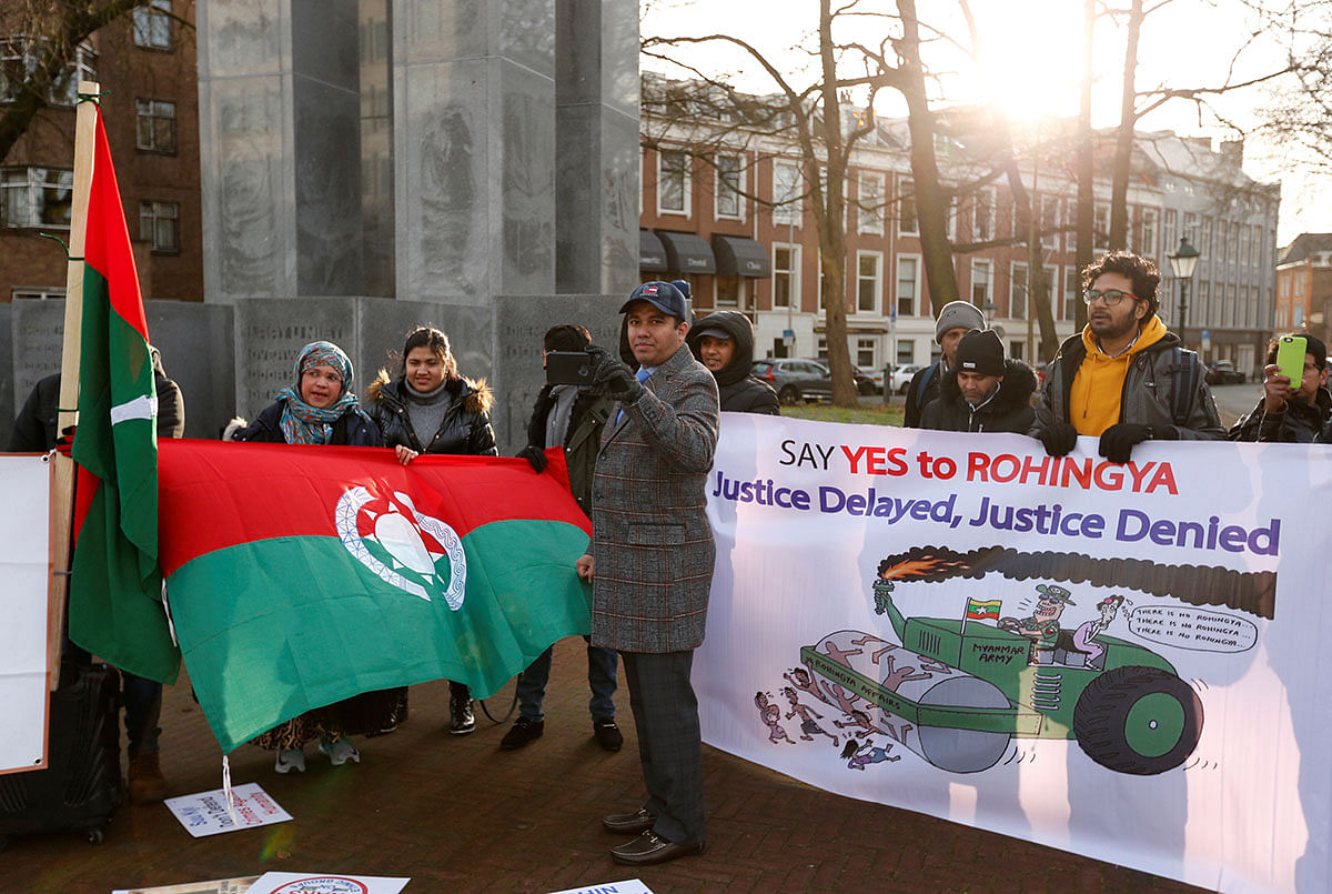 People protest outside the International Court of Justice (ICJ) during a hearing in a case filed by Gambia against Myanmar alleging genocide against the minority Muslim Rohingya population, in The Hague, Netherlands December 10, 2019. REUTERS