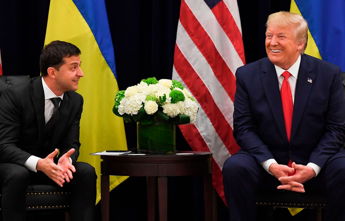 In this file photo taken on 25 September US president Donald Trump and Ukrainian president Volodymyr Zelensky shake hands during a meeting in New Yorkon the sidelines of the United Nations General Assembly. Photo: AFP